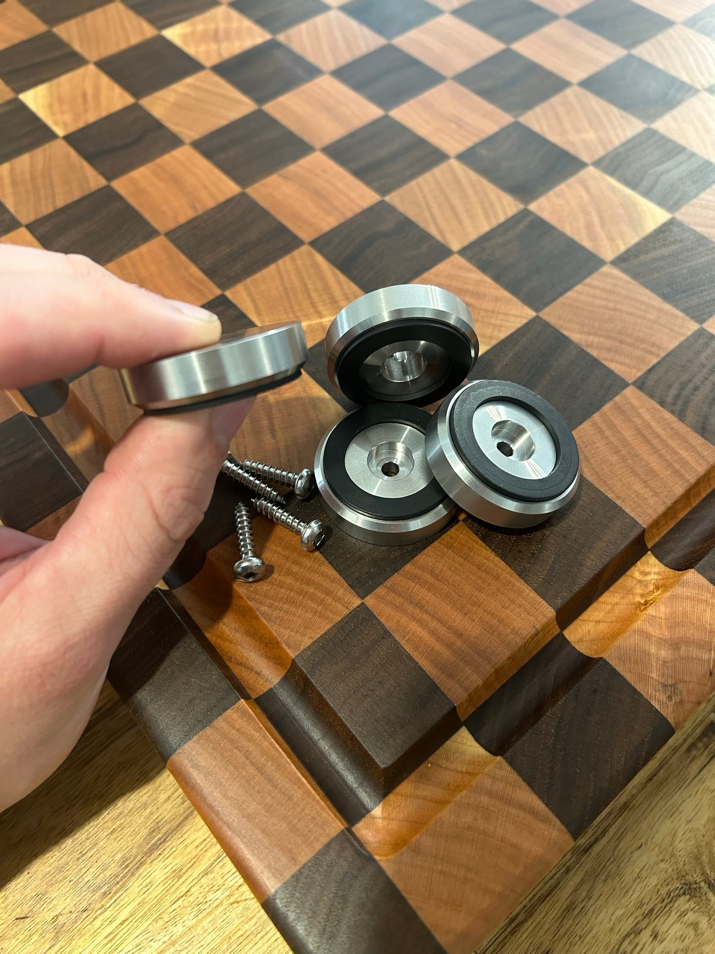 Brass and stainless steel cutting board feet