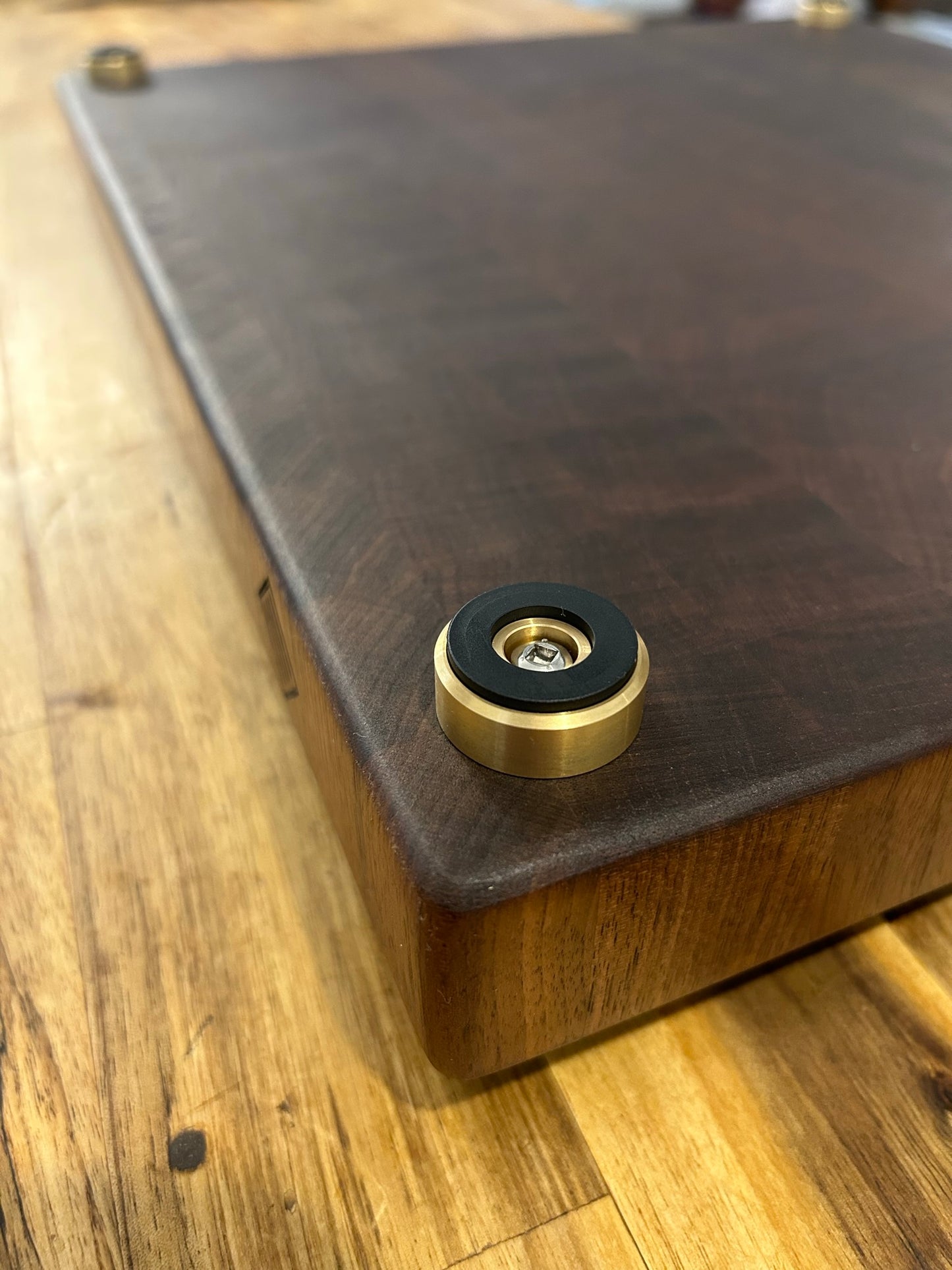 Brass and stainless steel cutting board feet